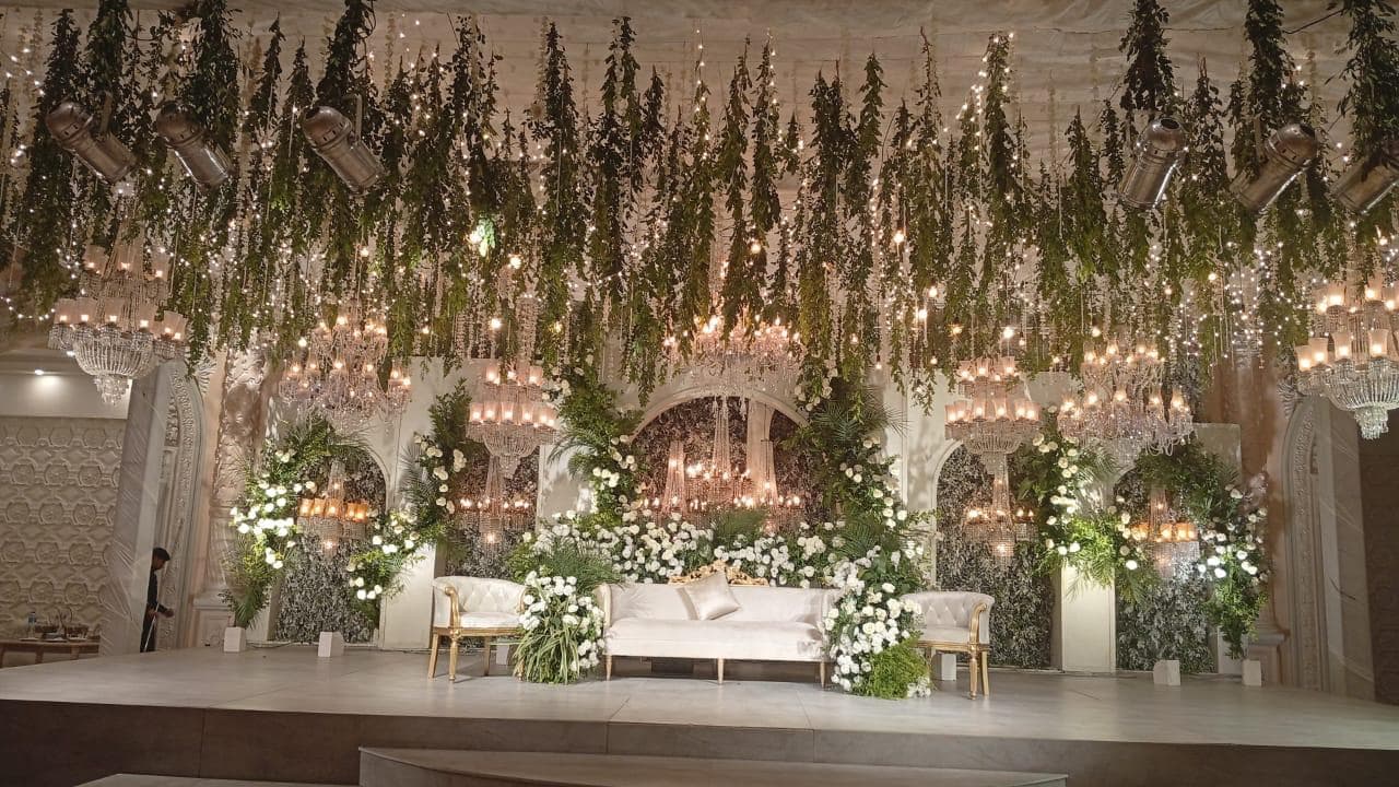 Grand stage design with structural elements by H&K Events